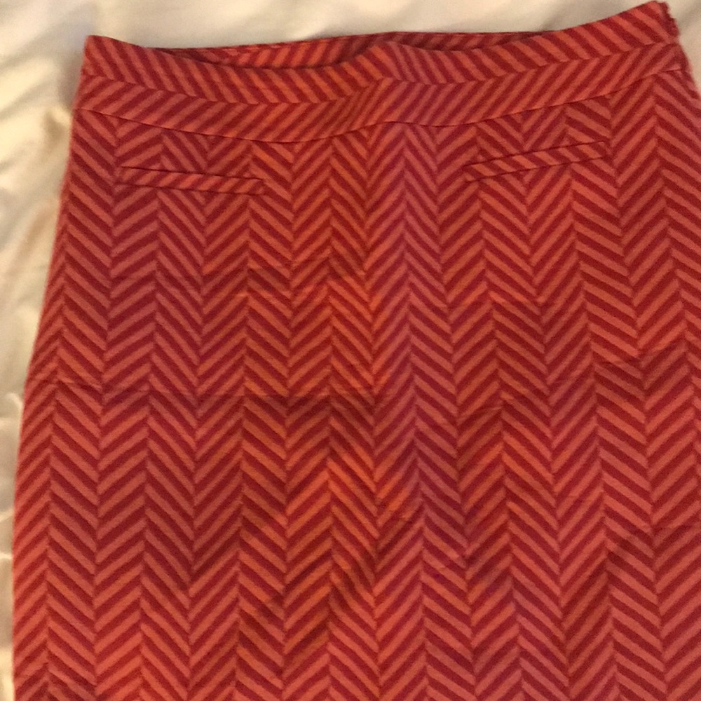 Pink and peach striped skirt.